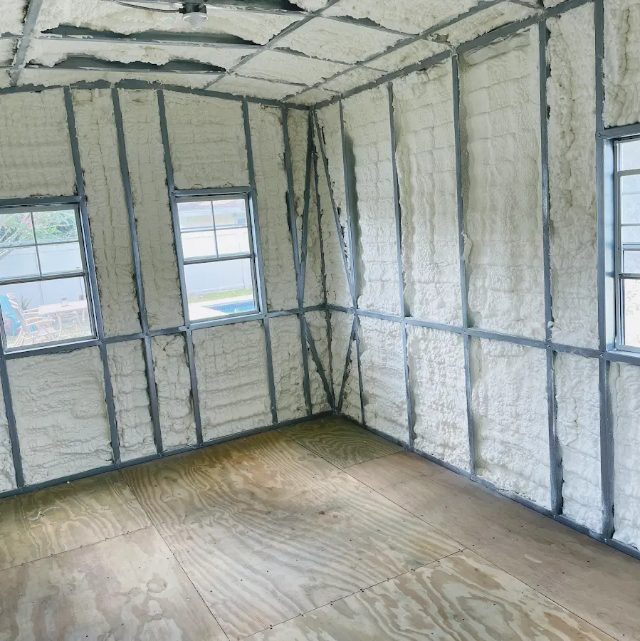 Closed-cell spray foam insulation applied to wall cavities in a residential project in Cape Coral